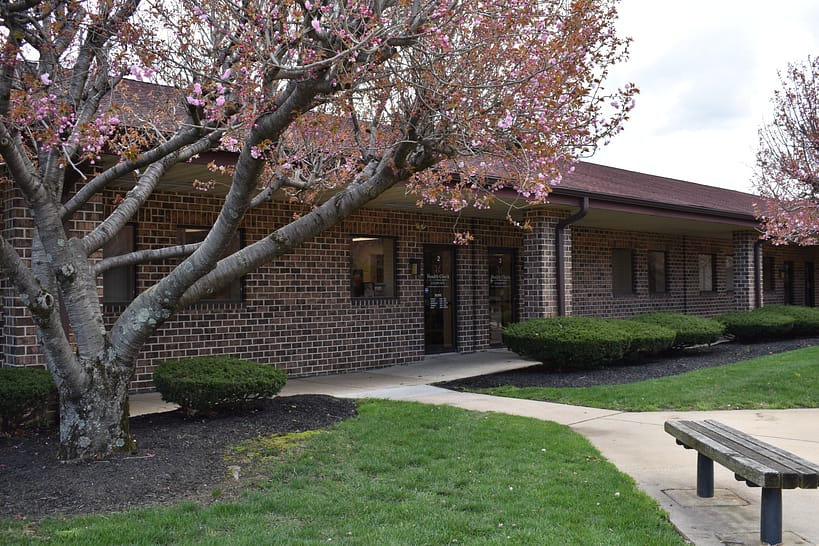 exterior view of Health Check Physical Therapy in early spring